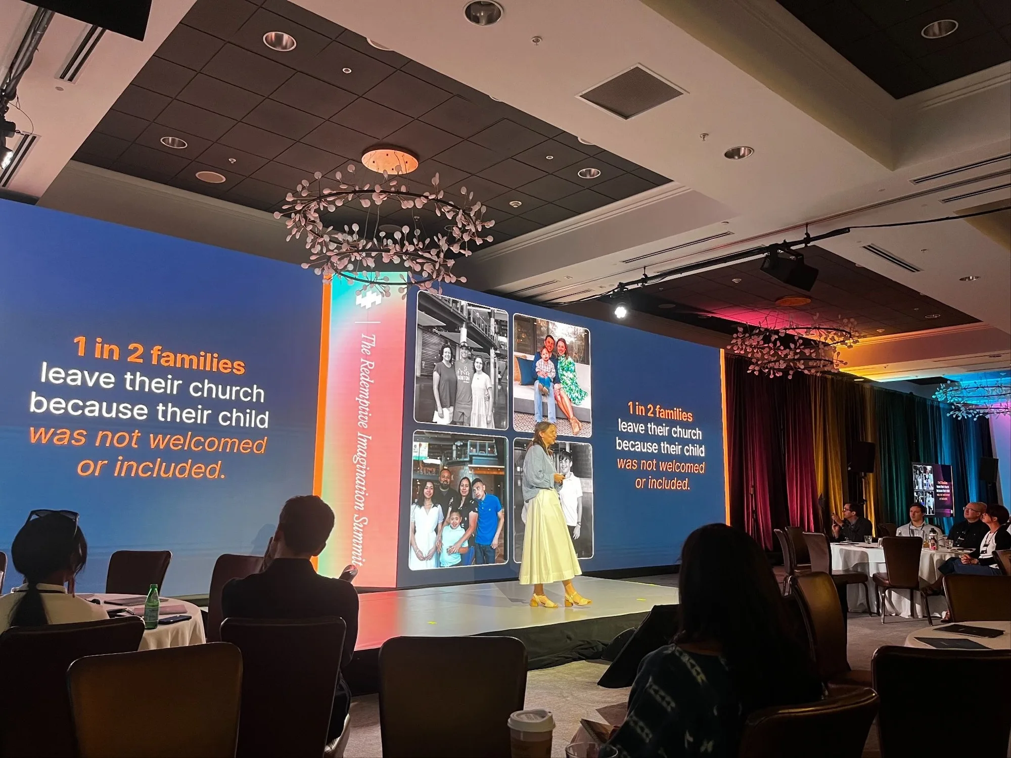 Flourish Fall 2026 Praxis pitch Rebecca Wall pitching on stage at the Praxis Redemptive Imagination Summit